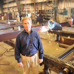 A Man; metal building manufacturer